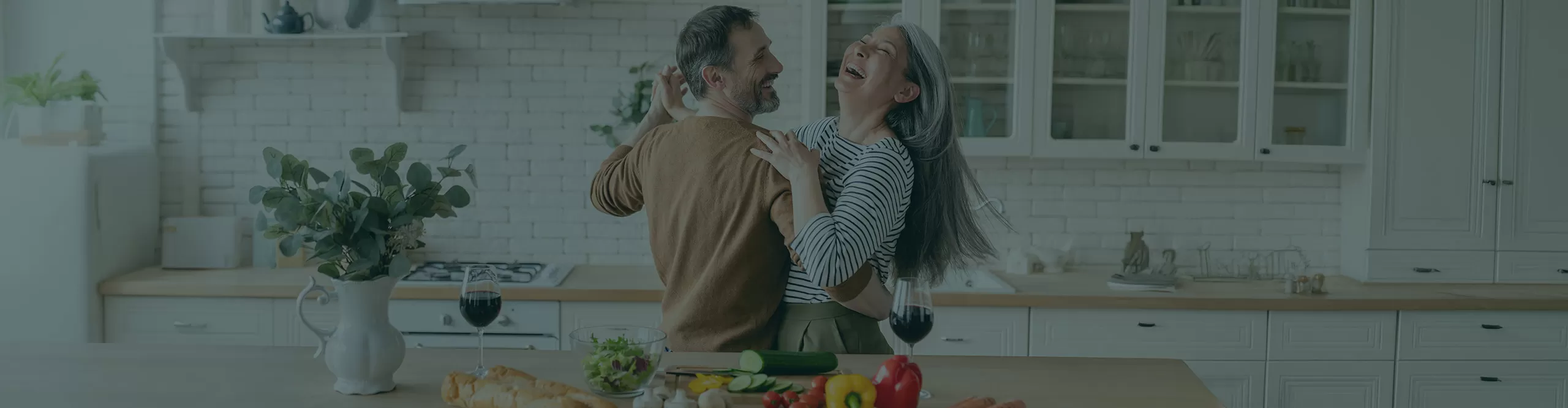 couple dancing in the kitchen