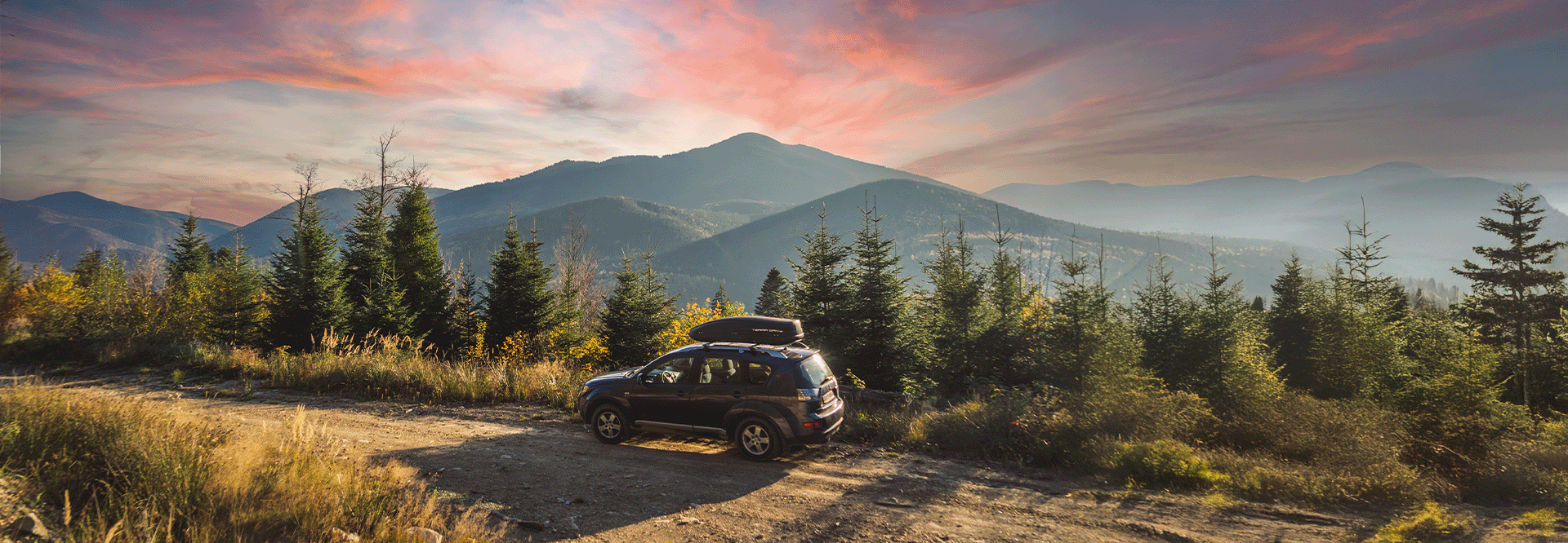 car driving on mountain road