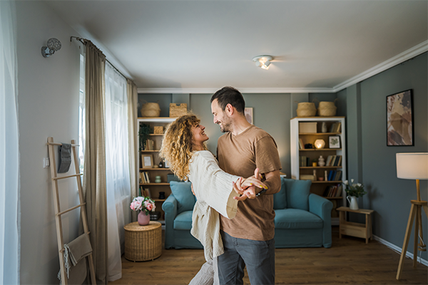 couple dancing in their home