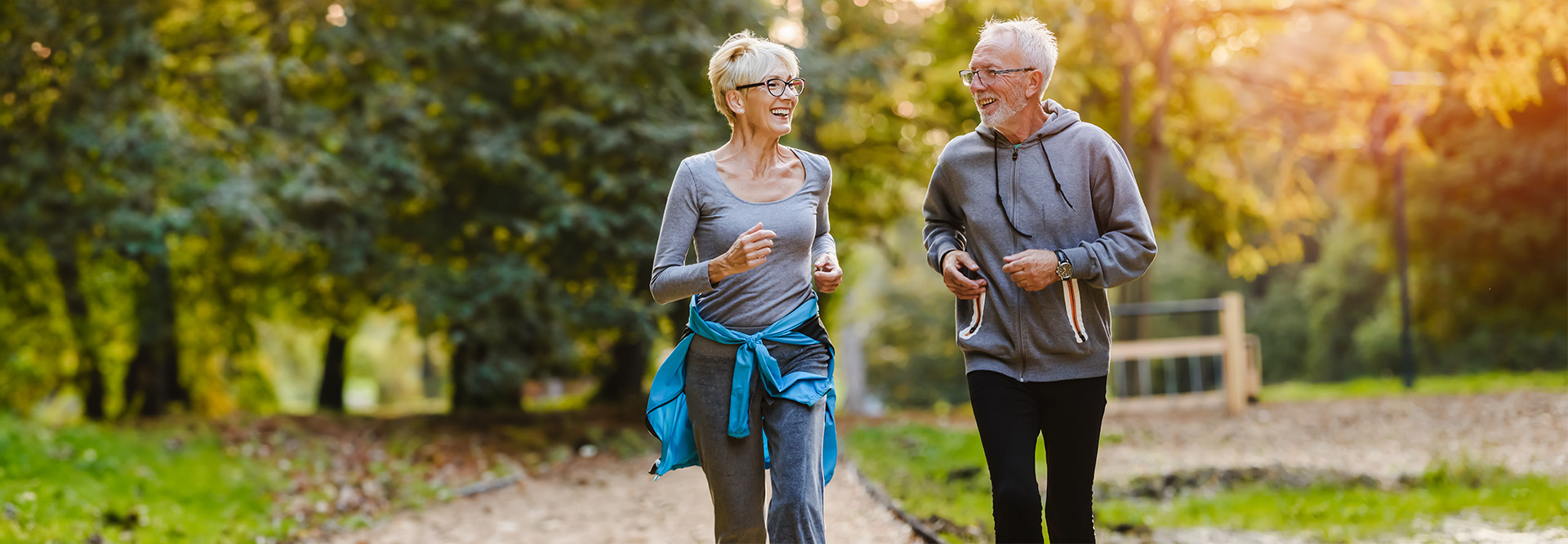 older couple jogging in the park