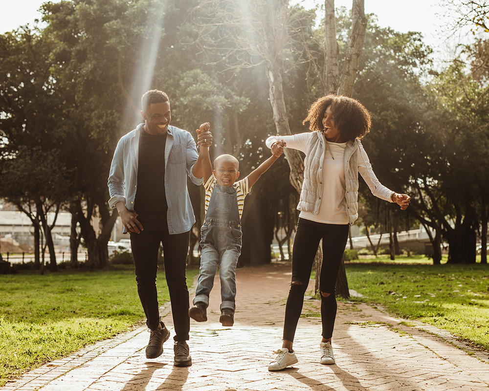family playing at park