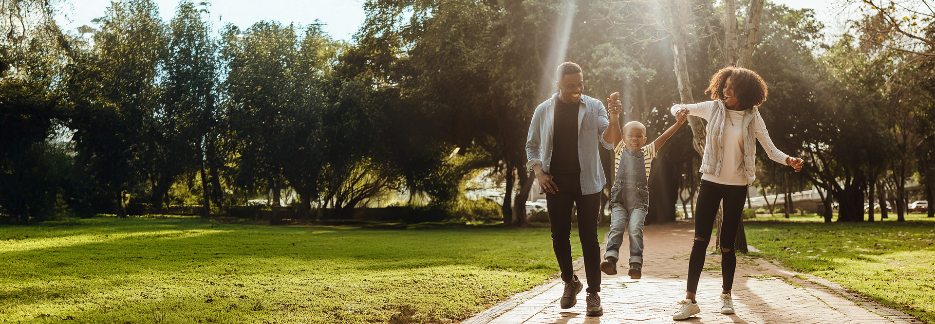 family walking in a park