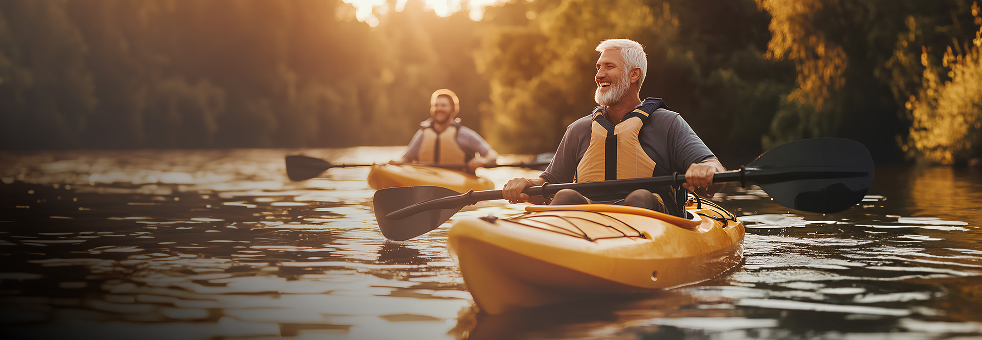 two older men kayaking on a river