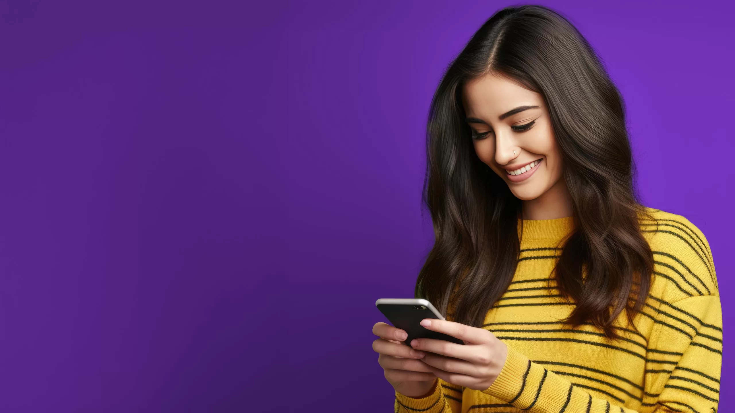 woman looking at phone using Zelle