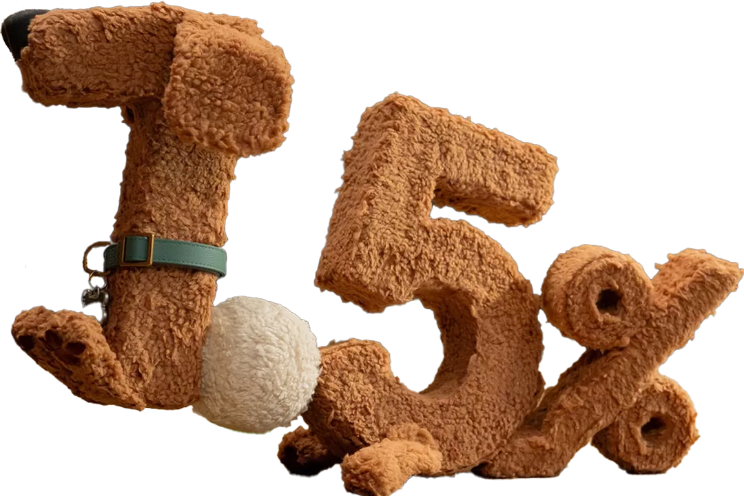 Plush 1.5% figure held by a Sandia Area member
