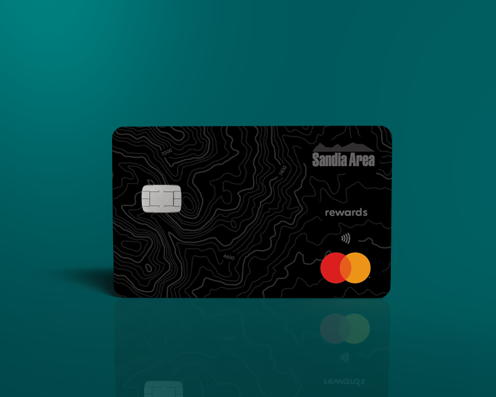 black credit card on gold background